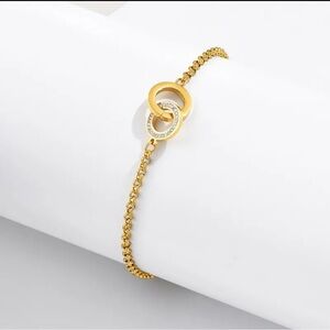 Elegant Gold and Silver Interlocking Bracelet
